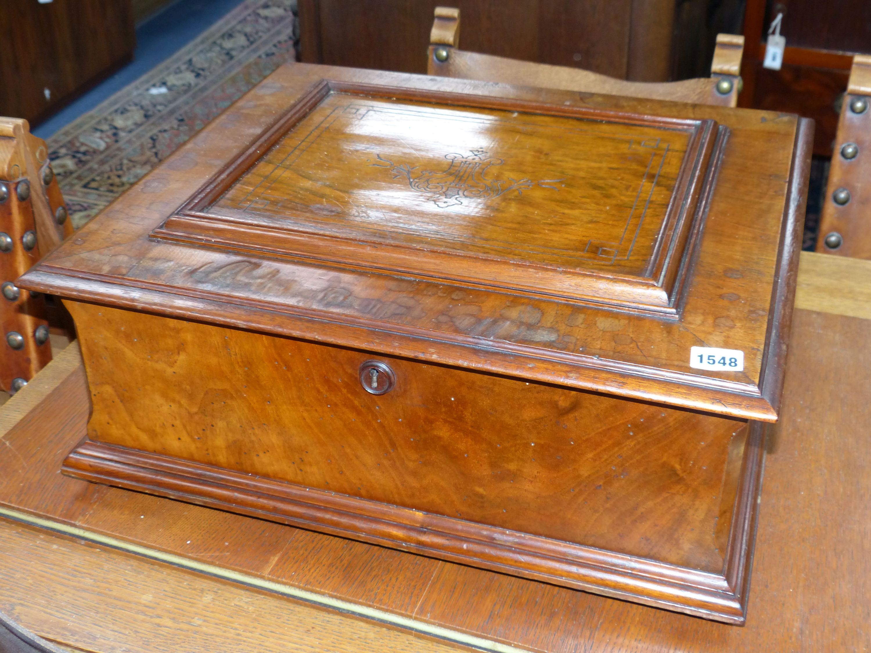 A large Polyphon walnut table top musical box, playing thirty 39.5cm discs